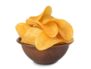 Bowl with tasty crispy potato chips on white background
