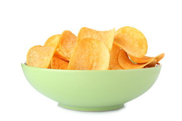 Bowl with tasty crispy potato chips on white background