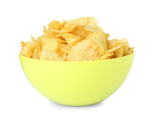 Bowl with tasty crispy potato chips on white background