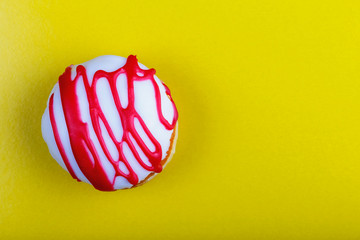 fresh tasty donut on a colored background with copy space