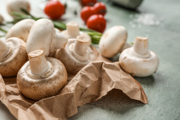 Fresh mushrooms on color table