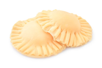 Raw ravioli on white background