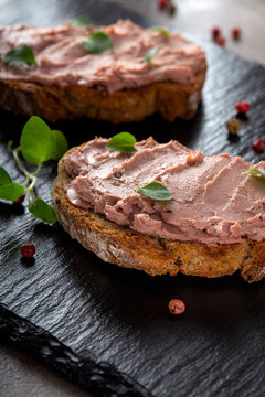 Fototapeta Open sandwiches with pate made from pork and turkey liver with sweet cranberry jam