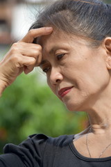 Old Asian Female Senior Decision Making