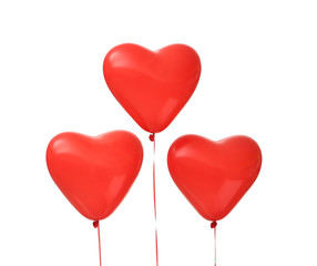 Fototapeta na wymiar Red heart-shaped air balloons for Valentine's day on white background