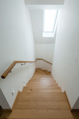 Detail of wooden stairway in modern house
