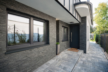 Naklejka premium Entrance door into modern house