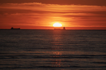 Naklejka na ściany i meble Sunset on Baltic sea.