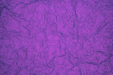 ABSTRACT RANDOM BACKGROUND OF CREASED CRUMPLED PURPLE TISSUE PAPER
