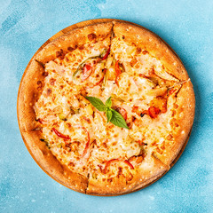 Pizza with chicken, pepper, pineapple.
