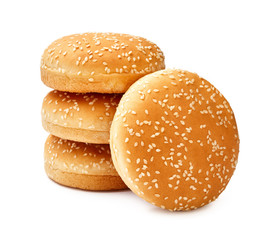 Four Hamburger buns with sesame isolated on white background