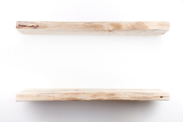 Wooden shelves on a white wall. Home interior