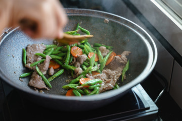 Cooking stir fried string bean vegetables
