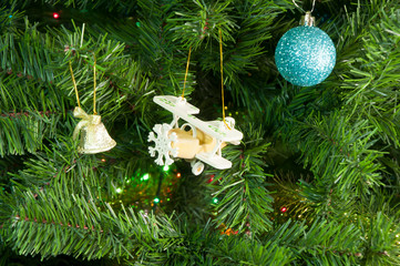 Wooden plane toy on the Christmas tree