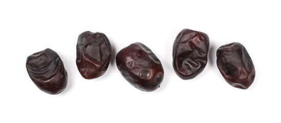 Fresh dates isolated on white background, sweet fruit, top view