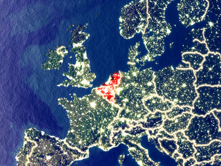 Benelux Union from space on Earth at night. Very fine detail of the plastic planet surface with bright city lights.