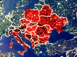 CEI countries from space on Earth at night. Very fine detail of the plastic planet surface with bright city lights.