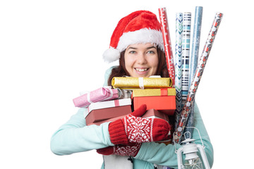 Photo of woman in Santa's cap with boxes with gifts with wrapping paper