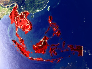 ASEAN memeber states from space on Earth at night. Very fine detail of the plastic planet surface with bright city lights.