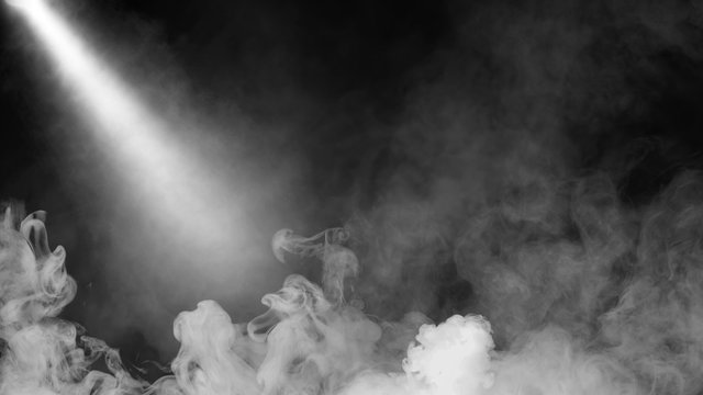 Dry ice smoke clouds fog floor texture. .White perfect sportlight mist effect on isolated black background