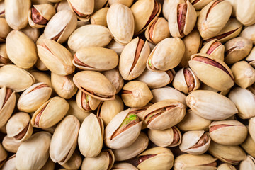 Pistachios nuts background. Pistachio texture. Top view