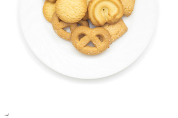 top view of butter cookies on plate with white background.