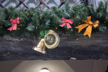 christmas door decorated,decorated with christmas branches and bells old wooden doors, christmas door to house