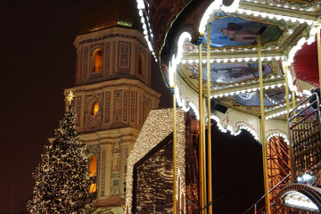 Kiev, Ukraine - 12/31/2017: Celebration of New Year and Christmas on Sophia Square. Sophia Cathedral on background.        