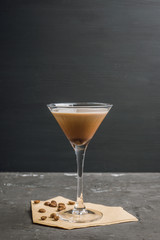 Chocolate martini with spices on the rustic background. Selective focus. Shallow depth of field.