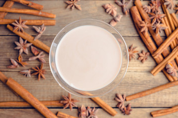 Chocolate martini with spices on the rustic background. Selective focus. Shallow depth of field.