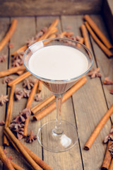 Chocolate martini with spices on the rustic background. Selective focus. Shallow depth of field.