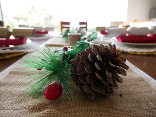 christmas composition with candle and pine cones