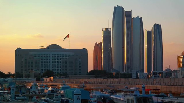 Beautiful view of Abu Dhabi city Etihad towers, famous landscape and Marina boats