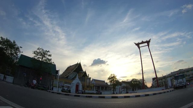 4K Time lapse traffic of big giant swing in front of temple in Bangkok
