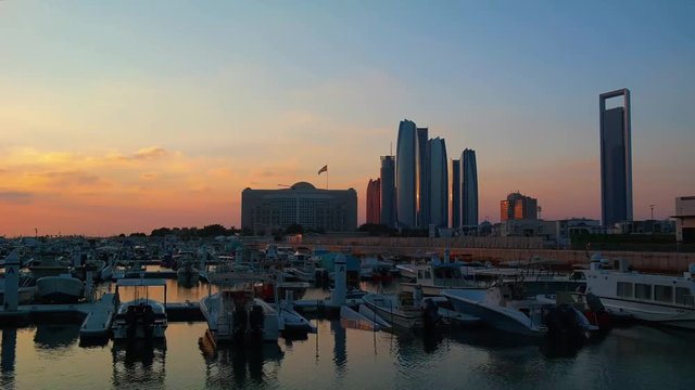 Beautiful view of Abu Dhabi city famous landscape, Etihad Towers, and Marina boats