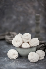 Obraz na płótnie Canvas Homemade zephyr (russian marshmallows) on gray background