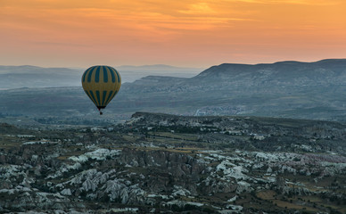 Hot-air balloon flying over Cappadocia