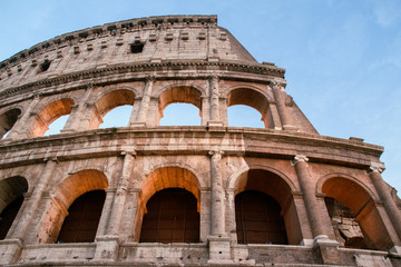 Obraz premium Detail of Colosseum at sunset.