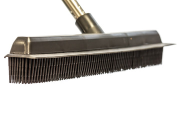 Black Rubber brush, with bristles for cleaning work, photograph with high key, white background