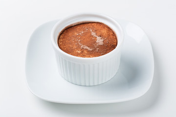 Creme brulee dessert in a white pannikin