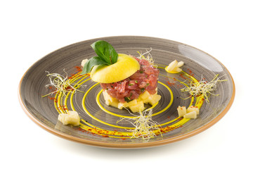 A gourmet fish pate with garnishes and copy space