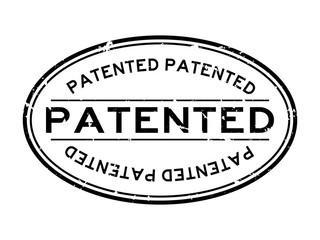 Grunge black patented word oval rubber seal stamp on white background