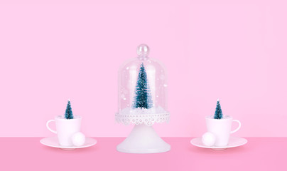 Creative Christmas design on pink pastel color background with Christmas tree.