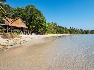 Paradisiacal shoreline with resting hut