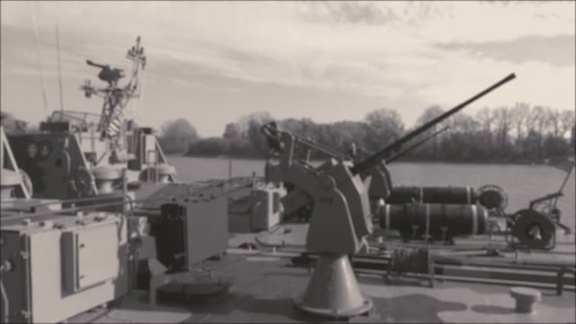 Battle Ships Anchored in a Military Base / Warships of a river fleet anchored in a military base