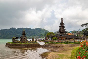 Pura Ulun Danu Beratan in cloudy day, famous temple on the lake, Bedugul, Bali, Indonesia.