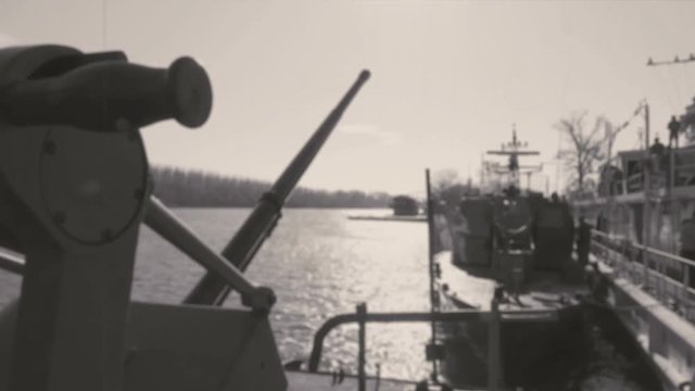 Warship Minesweeper with Weapons / Warships of a river fleet anchored in a military base