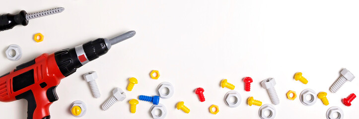 Kid toys construction tools border on white background