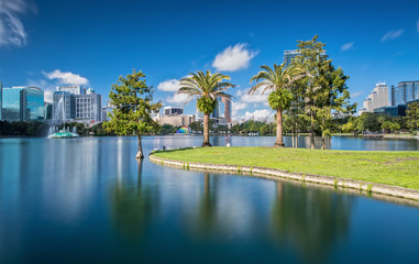 Downtown Orlando from Lake Eola Park on a beautiful sunny Day - obrazy, fototapety, plakaty