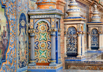 Fototapeta na wymiar Details of tile columns and walls of the famous Plaza de Espana, example of architecture of Andalusia, Sevilla